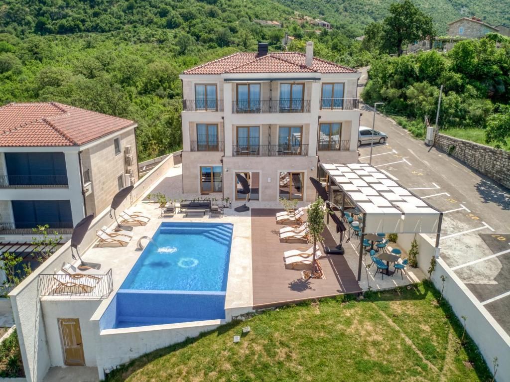 Luksuzna vila sa bazenom i panoramskim pogledom na more – Tudorovići, Budva - Amfora Real Estate